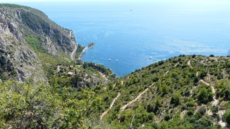 View of the south coast at the exit of Monaco, towards the Alps