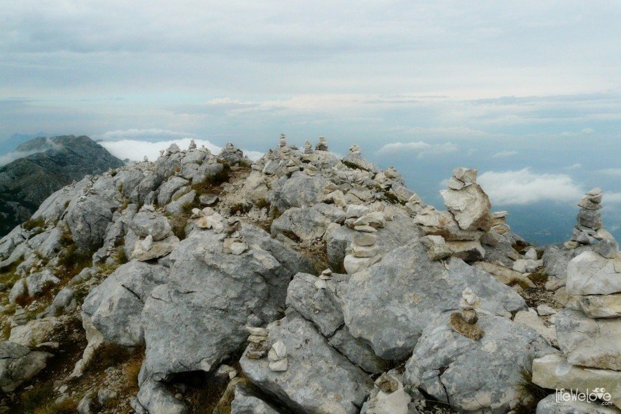 Small, stone hikers on top of Sveti Jure